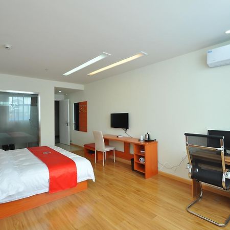 Thank Inn Chain Hotel West Eleven Road Mall Линьи Экстерьер фото