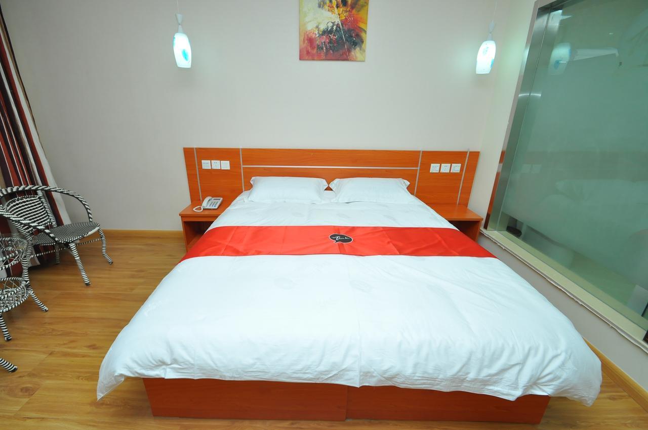 Thank Inn Chain Hotel West Eleven Road Mall Линьи Экстерьер фото