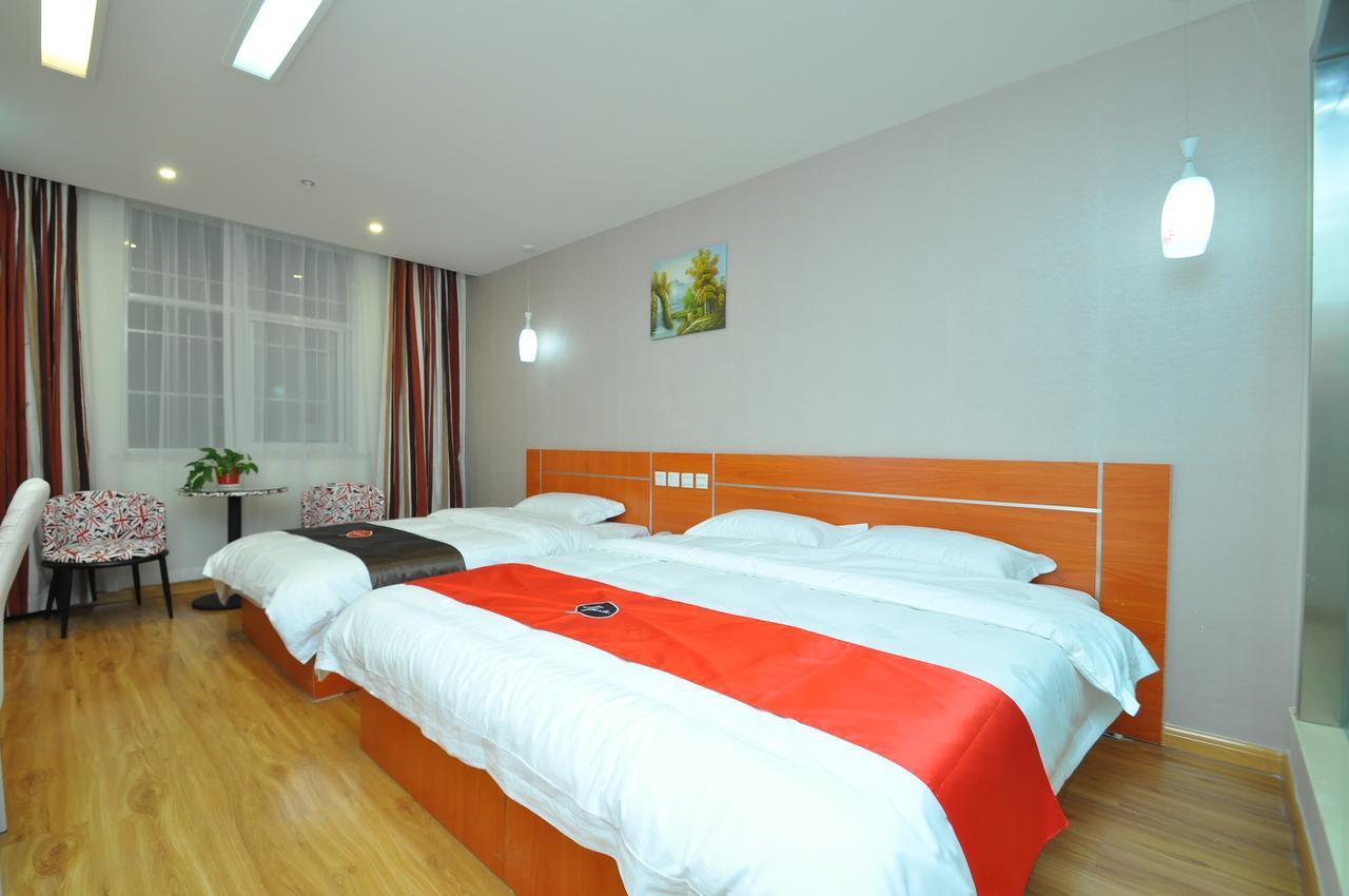 Thank Inn Chain Hotel West Eleven Road Mall Линьи Экстерьер фото
